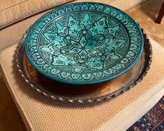 Formal Living Room 
Large copper tray
Pottery bowl
Ottoman 