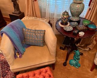 Formal Living Room 
Mohair blanket
Cloisonné pieces
Bunnies 
Tufted footstool 
Pie crust table