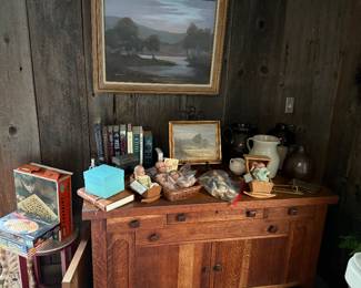 Family Room 
Mission style sideboard 
Madame Alexander quintuplets dolls