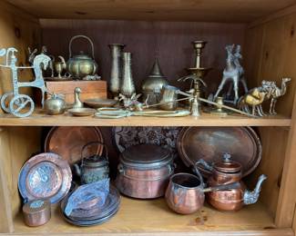 Family Room 
Brass items from their travels 
Copper & copper plated items from their travels-European 