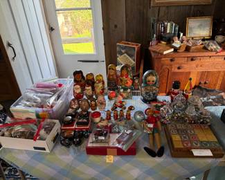Family Room - Case Table
Russian stacking dolls, vintage Christmas ornaments, marbles, wooden Pinocchio, wooden blocks
