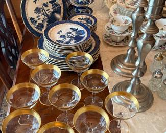 Dining Room 
Gold rimmed stemware
Booths- Real old Willow set