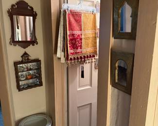 Downstairs Hallway
Mirror 
Blue & white jardiniere
Curio cabinet
Brass mirrors
Runners 