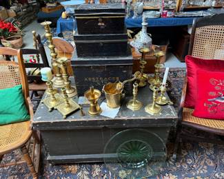 Family Room 
Early trunk
Brass candlesticks 
Document boxes