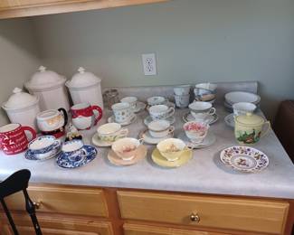 Pretty little tea cups all in a row 