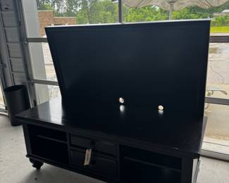 Entertainment center with back board