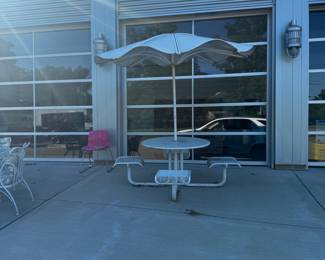 Metal outdoor table with umbrella