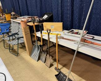 tools, shovels, roll of leather, Forstner bit set, Craftsman sander, lawn chairs