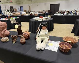 Handwoven African baskets, handmade Indian doll, Bronze Blackhawk statue made by Jeff Adam’s