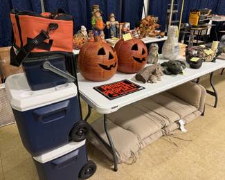 coolers, outdoor statues, lounge chair cushions