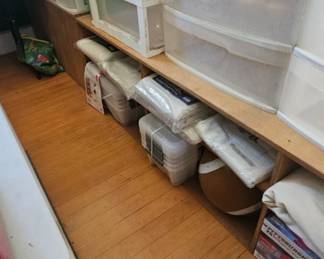 Lots of plastic storage bins