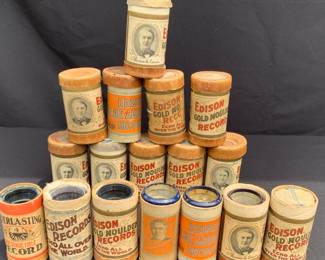 Edison wax cylindrical recordings in original packaging.