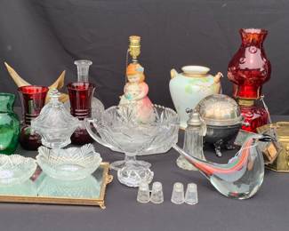 Dresser tray, crystal, art glass and ruby red oil lamps.