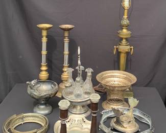 Brass lamp, candle sticks, cruet set and serving pieces.