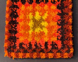 Hand hooked piece of artwork. Suitable for framing!