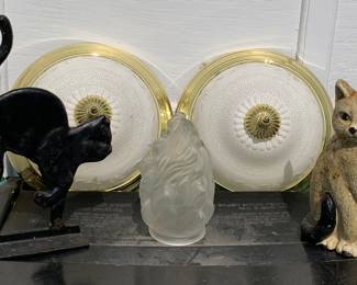 Flush ceiling lights, black and white cat cast iron door stops, frosted “flame” light shade