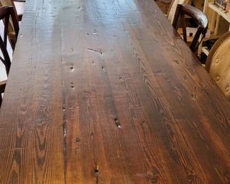 Handcrafted table made from wood from a pre-Civil War barn from artisans outside of Macon. Seats 10 comfortably. One owner.