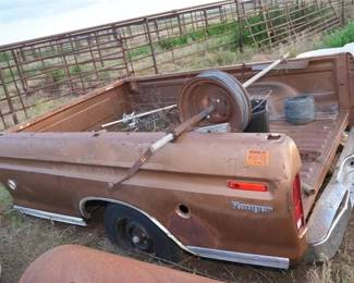 truck bed/trailer with fencing supplies