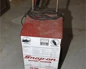 Snap-on battery charger