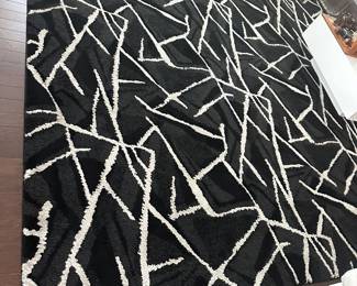 Black and white rug. 10.5 x 10.17