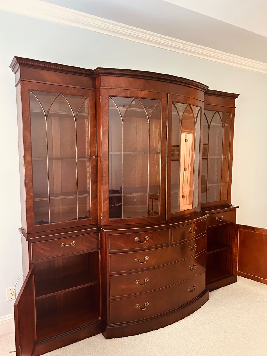 Pre-Sell Price $1200...Traditional Breakfront China Cabinet...Arched mullioned glass doors with wood fretwork, bowed front with five drawers, crown molding, and dentil trim along the top. Purchased at Englishman's Fine Furnishings in 2006 for $7000. 94w x 20d x 86h