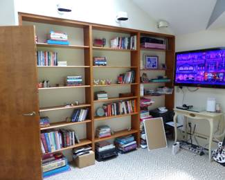 Books, bric-a-brac, TV, writing desk
