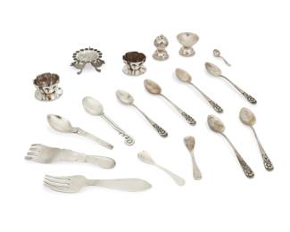 332
Mid-20th century
A group of Mexican silver tableware
Variously marked for maker and for Mexico, fifteen marked for sterling; further variously marked: [Eagle 22] / [Eagle 3] / [Eagle 12]
Comprising four salt cellars and a shaker, two by Bernice Goodspeed, and one a Fred Davis figural tripod cellar with "cat" legs, together with two small sterling silver forks, one by Rafael Dominguez, and one by Sanborns, as well as a small William Spratling spoon with pierced design and incised lines, and a small Victoria/Ana Maria Nunez de Brilanti demitasse spoon with scrolled end, plus three diminutive salt spoons, two by Sanborns, and six sterling silver demitasse spoons with floral handles
18 pieces
Largest cellar: 1" H x 2" Dia.; Largest fork: 4.5" L; Largest spoon: 4.25" L
6.870 oz. troy approximately
Estimate: $500 - $700
