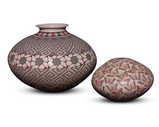 200
Two Mata Ortiz polychrome pottery jars
Late 20th/early 21st century; Chihuahua, Mexico
Two works:
Martha Martinez Dominguez (b. 20th century)
Incised to underside: Martha Martinez Dguez
The wide-bodied three-color jar with flared rim, featuring red and black fine-line and banded floral motifs on a white slip ground
9.5" H x 12.125" Dia.
Celia Lopez (b. 20th century)
Incised to underside: Celia Lopez
The polychrome jar with red, pink, blue, and green butterfly motifs with sgraffito bordering, on a white slip ground
5.25" H x 7.25" Dia.
2 pieces
Estimate: $400 - $600
