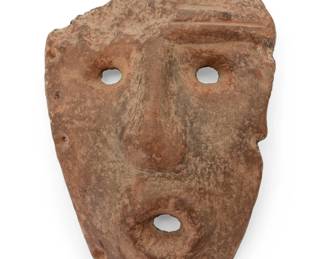 92
Formative Period 500BCE-650CE or later; Catamarca, Argentina
A Pre-Columbian carved stone mask
With metal accession label, possibly from the Museo de la Plata in Argentina: [logo] / MPA / 8 / 206
Likely Condorhuasi-Alamito, the partial funerary mask with perforation to each side, set on an acrylic stand
Mask: 8.375" H x 5.5" W x 2.5" D; Stand: 7.25" H x 7.5" W x 4.25" D
Estimate: $600 - $800
