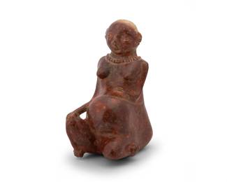 267
1st century CE; West Mexico
A Pre-Columbian Nayarit pottery figure
The terracotta figure of a pregnant female, with red mineral glaze, and incised details to head, depicted seated and wearing a necklace
9" H x 4.375" W x 6.25" D
Estimate: $500 - $700