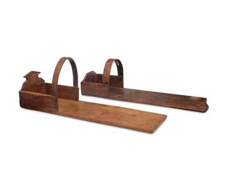 254
Late 19th/early 20th century
Two Guatemalan wood cradleboards
Carved and bentwood frames
2 pieces
Larger: 12.5" H x 32.5" W x 10.25" D; Smaller: 10.25" H x 33" W x 9.5" D
Estimate: $600 - $800