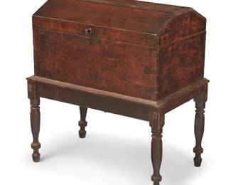 253
19th century; Guatemala
A Spanish Colonial wood trunk
The wood trunk with hinged lid, butterfly joints, and an iron locking mechanism, set on a conforming stand of mortise and tenon construction raised on turned legs
Overall: 29.5" H x 27" W x 17.75" D; Trunk: 14.25" H x 24.5" W x 18" D
Estimate: $800 - $1,200