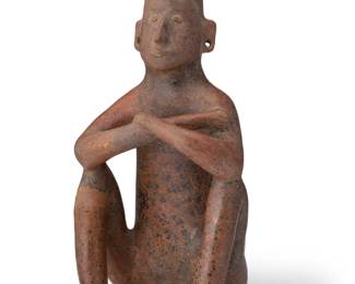 265
1st century CE; Colima, West Mexico
A Pre-Columbian Colima pottery effigy vessel
The hollow-bodied ceramic figural vessel depicted seated with arms crossed and incised facial features
17.5" H x 8.75" W x 9.375" D
Estimate: $1,000 - $2,000