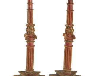 227
19th century
A pair of Spanish Colonial carved wood torchères
The parcel-gilt and red-painted wood candle holder pedestals, each with a gilt tole crown above a columnar standard with foliate motif accents, raised on a tiered triangular base
2 pieces
Each: 59.5" H x 21.75" W x 19" D
Estimate: $1,500 - $2,500