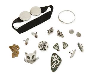 365
A group of silver and mixed metal jewelry
Mid/late 20th century
Most variously marked for maker, for Mexico and for sterling; further variously marked: [Eagle 3] /
Ten works in sterling silver and mixed metal, some with set stones and stone inlay, by various makers including Enrique Ledesma, Bernice Goodspeed, and Thomas Mann, comprising four figural brooches in various designs including a cat face and a serpent, as well as five pairs of earrings including a pair with shadowbox Pegasus motif, and one pair with bird motifs, together with a black ribbon choker necklace with round sterling "belt buckle' clasp, and a sterling silver wire bangle with 10K gold accent and decorative spring latch,16 pieces
Choker: 14.5" L x 1.5" H; Bangle: 6.75" inner C; Largest brooch: 1.375" H x 2.5" W; Largest earring: 1.375" H
116.2 grams gross
Estimate: $300 - $500