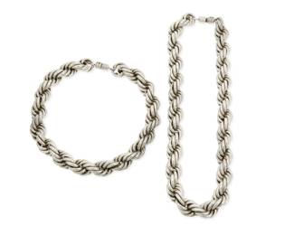 346
A set of Mexican silver rope twist necklaces
Late 20th century
Stamped: Mexico / 925 / TC-222
Comprising two chunky silver rope twist necklaces, each with barrel clasp, 2 pieces
Larger: 21.5" L x 0.75" H; Smaller: 17" L x 0.75" H
412.0 grams
Estimate: $500 - $700