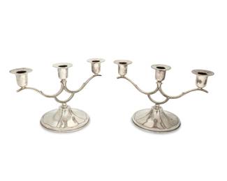 289
Mid-20th century; Mexico City, Mexico
A pair of Conquistador sterling silver candelabra
Each marked to underside: [Eagle 13] / Conquistador / Sterling Mexico / 925/1000
The three-light candleholders, each with chased accents
2 pieces
Each: 7" H x 11.5" W x 6" D
38.4 oz. troy approximately
Estimate: $800 - $1,200