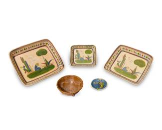 337
Mid/late 20th century; Mexico
A group of Tlaquepaque pottery serving platters and bowl
Platters stamped within a heart cartouche: Made in Mexico; ashtray inscribed illegibly
Comprising three graduated serving dishes and an ashtray, each decorated with painted scenes depicting cacti and a figure, and a footed bowl with incised detailing to interior
5 pieces
Largest platter: 2.125" H x 12.25" W x 10.5" D; Bowl: 2.625" H x 6.25" Dia.
Estimate: $100 - $200