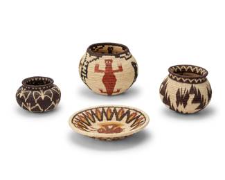 221
Late 20th/early 21st century; Darién Province, Panama
A group of Panamanian Wounaan basketry vessels
The polychrome coiled baskets woven from palm frond fibers, each depicting rainforest floral and fauna including three depicting butterflies and one depicting various birds and lizards
4 pieces
Largest: 5" H x 6.25" Dia.; Low bowl: 1.625" H x 7.375" Dia.
Estimate: $400 - $600