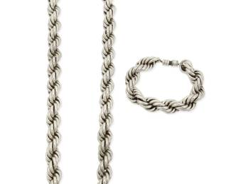 345
A set of Mexican sterling silver rope twist jewelry
Late 20th century
Stamped: Mexico / 925 / TC-222
Comprising a chunky silver rope twist necklace and matching bracelet, each with barrel clasp, 2 pieces
Necklace: 27.5" L x 0.75" H; Bracelet: 9" L x 0.75" H
384.2 grams
Estimate: $500 - $700