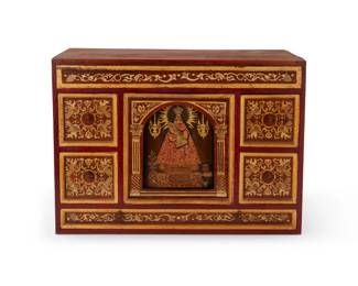 233
Early 20th century
A Peruvian inlaid wood tabletop cabinet
The six-drawer wood cabinet with bird-form metal pulls, featuring gilt accents and bone-inlaid avian and foliate motifs, the central panel depicting a painted and gilt figure of Nuestra Señora de Belén, a patron saint of Cuzco, Peru
10.625" H x 14.875" W x 9" D
Estimate: $800 - $1,200