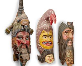 333
Mid-20th century
Three Mexican folk art masks
The polychrome carved wood masks, comprising one depicting a jaguar and woman within a fish figure, an armadillo figure mask, and a bat figure mask
3 pieces
Largest: 36" H x 14.5" W x 9.25" D; Smallest: 20.75" H x 8.25" W x 5.75" D
Estimate: $500 - $700