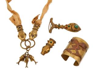 141
A group of mixed metal jewelry
Mid-20th century
Variously marked for maker and for Mexico
Four works comprising a brass Hubert Harmon-style Maya two-piece snake head buckle with fish dangles and set amethyst accents, attached to a beige suede belt strap, together with a brass Hubert Harmon-style Maya cuff with intertwined fish with amethyst eyes, as well as a single snake-head belt buckle with green stone accents, and a brass and set-stone fish motif single buckle, 4 pieces
Cuff: 6.25 inner C x 2.75" H; 2-piece buckle: 4" H x 5.5" W (closed); fish: 2.5" H x 4" W; snake head: 1" H x 2.5" W
228.1 grams gross
Estimate: $300 - $500