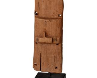 90
19th century or earlier; Central America
A Chancay-style wood mask
The wood figure set in an enameled metal stand
Mask: 14.5" H x 5.5" W x 2.375" D; Stand: 13.125" H x 5" W x 5" D
Estimate: $400 - $600