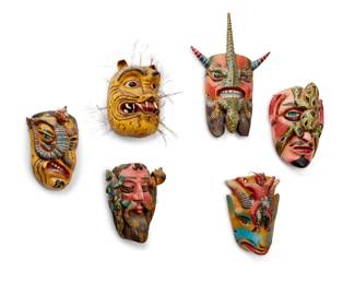 334
Early/mid-20th century
A group of Mexican folk art masks
The polychrome carved wood masks, comprising one mounted with a frog figure, one jaguar mask mounted with a devil and a dog, one mask mounted with a serpentine devil figure, one devil mask mounted with a lizard, one mask mounted with a lizard figure and a lion figure, and a jaguar mask
6 pieces
Largest: 15.5" H x 10.5" W x 4.5" D; Smallest: 9.5" H x 7.5" W x 5.5" D
Estimate: $600 - $900