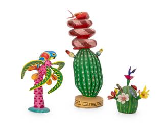 316
Late 20th/early 21st century; Oaxaca, Mexico
Three Mexican alebrijes figures
Palm tree signed and inscribed to underside: Viki Mendoza M. / San Martin / Tilcajete / Ocotlan / Oaxaca / Mexico; barrel cactus signed: Feliciano Santiago; prickly pear signed and inscribed: Melchor / Mitla / Oaxaca
The vibrantly painted folk art figures carved from copal wood, comprising a palm tree mounted with fruit and frond, surmounted by a parrot figure, a barrel cactus mounted with flowers, insects, and birds, and a prickly pear cactus with a snake figure
3 pieces
Prickly: 20.5" H x 8.5" W x 8" D; Barrel: 9.5" H x 9.5" W x 8.25" D
Estimate: $200 - $400