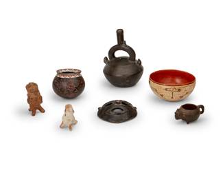 350
20th century or earlier
A collection of Latin American pottery items
Comprising a Peruvian Chimú blackware effigy bottle with stirrup spout, a Chimú handled effigy cup, a Shipibo-Conibo bowl decorated with Icaro lines, a polychrome terra cotta reproduction of a Mayan vessel depicting red figures on a black field, two Mayan-style figural whistles, and a blackware mask
7 pieces
Chimu: 9.125" H x 6.25" W x 6" D; Smallest whistle: 3.5" H x 2.875" W x 2.125" D
Estimate: $400 - $600