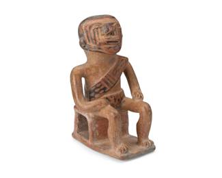 147
Circa 900 CE; Narino-Carchi, Colombia/Ecuador
A Pre-Columbian Capulí pottery coquero figure
The ceramic figure of a male dignitary chewing coca-leaf, depicted seated on a stool and adorned with face paint and a diagonal sash with geometric motifs
7" H x 4.125" W x 4.375" D
Estimate: $300 - $500