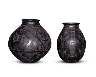360
Early 21st century; Chihuahua, Mexico
Two Mata Ortiz blackware pottery vessels
Two works:
Eusebio Sandoval (b. 20th century)
A blackware pottery jar
Incised to underside: Eusebio Sandoval
With black on black fish and bird figures to body below a flared rim
10" H x 9.5" Dia.
Israel Sandoval (b. 20th century)
A blackware pottery vase
Incised to underside: Israel Sandoval
With black on black alternating lizard figures and bands of tracks motifs
9.25" H x 6.5" Dia.
2 pieces
Estimate: $300 - $500