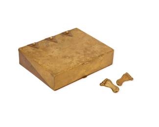 140
A Hubert Harmon mixed metal box & buttons
Hubert Harmon (1913-2004)
Mid/late 20th century, Mexico City, Mexico
Each stamped: Mexico; box further stamped: Hubert Harmon
Two works comprising a hinged box with brass lid and copper triangle accents, and a copper base, as well as two brass Hubert Harmon-style "barefoot" buttons, 3 pieces
Box: 1.25" H x 5.125" W x 4.125" D ; buttons: 1.375" H
420.4 grams gross
Estimate: $300 - $500